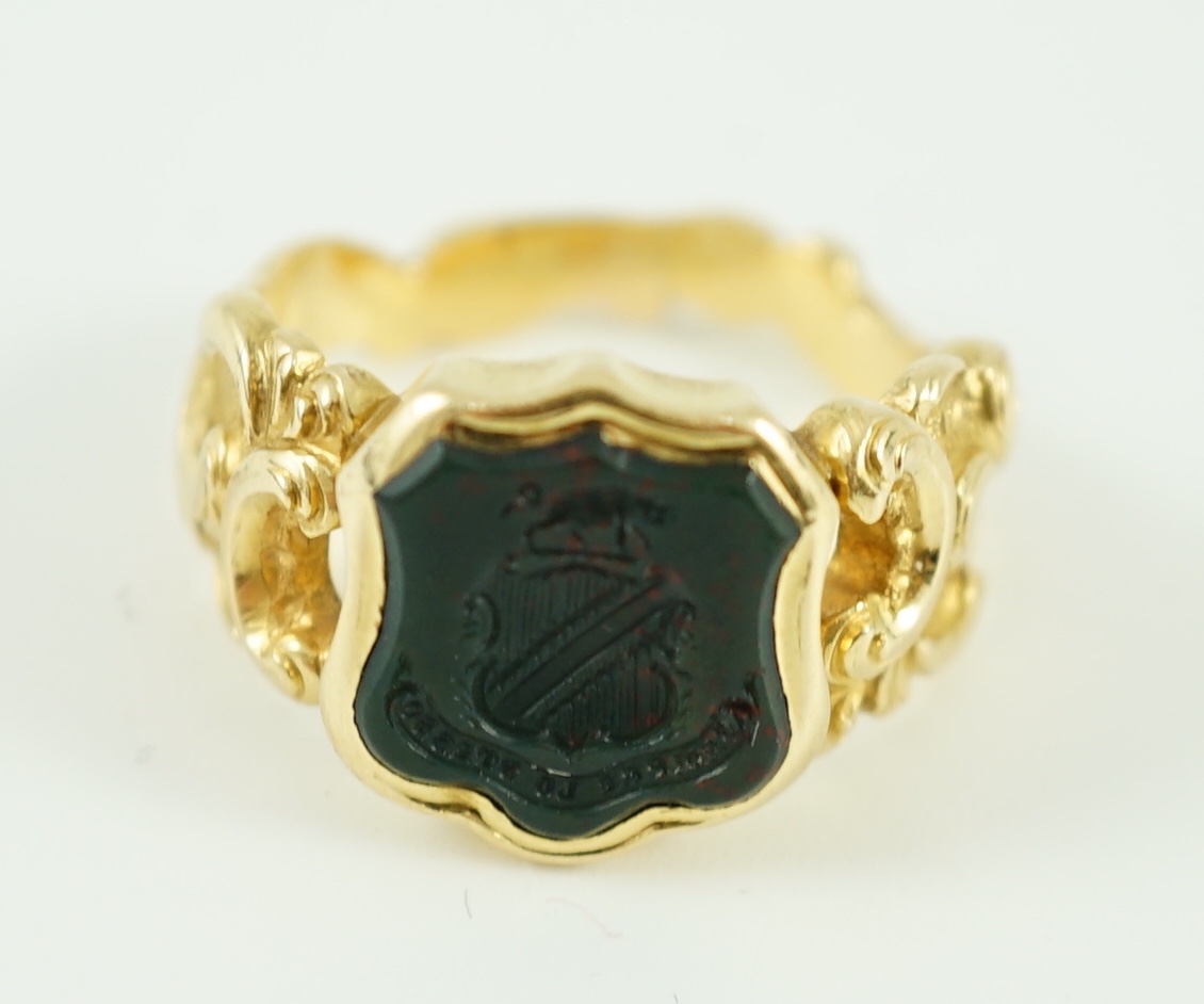 A 19th century gold and bloodstone set intaglio ring